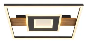 Pikara 38cm Træ plafond Fra Globo Lighting - Lampan &auml;r tillverkad i en stilfull kombination av metall i tr&auml;look och en mattsvart finish, vilket ger den en modern men samtidigt naturlig k&auml;nsla.