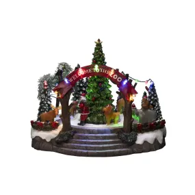Mekanisk Juledekoration Med Zoologisk Have 20cm Flerfarvet Fra Konstsmide - Denne mekaniske juledekoration byder p&aring; en farverig scene med 19 varmhvide LED-lys, musik, dyr og julemanden omkring et funklende juletr&aelig;.