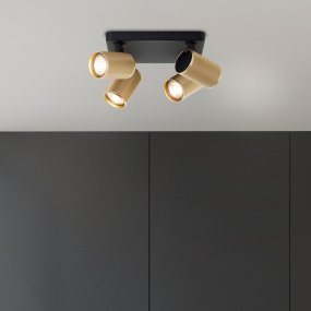 Marty 4 Sand sort spotlight Fra Brilliant - Med en metalkasse af høj kvalitet og gyldne detaljer giver det et stilrent udtryk, der passer ind i forskellige rum.