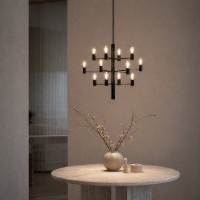 Manola 12 Ø60 Sort loftslampe Fra Herstal - Perfekt til placering i en rummelig entr&eacute; eller over spisebordet, hvor den kan tage sin plads og sprede et smukt lys.