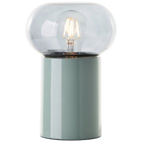 Knut 22cm Grøn bordlampe Fra Brilliant - Denne stilfulde bordlampe kombinerer metal og glas i et moderne og dekorativt design.