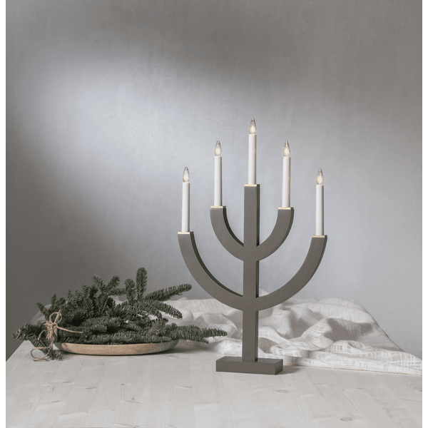 Anno Muldvarp Fra Star Trading - med malede tr&aelig;bakker i guld som dekoration.