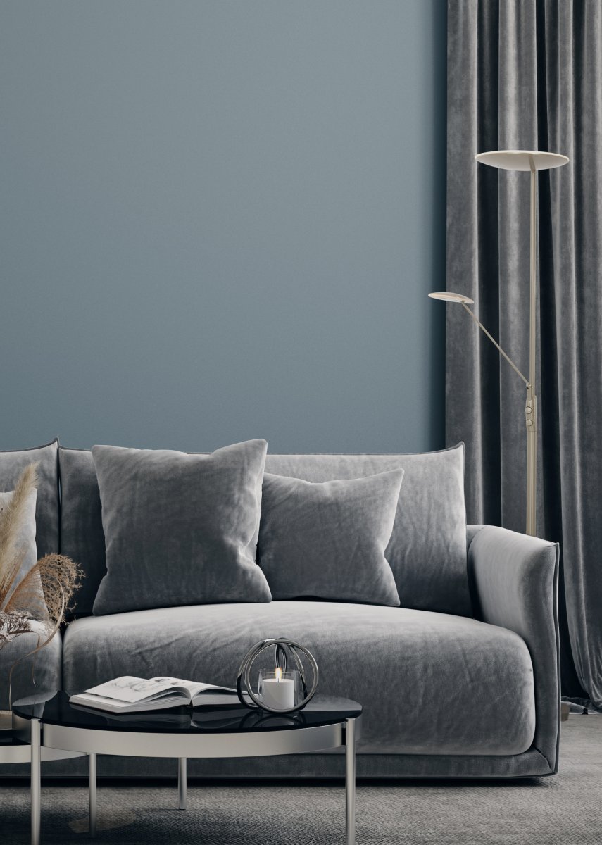 Cadiz Stål gulvlampe Fra Aneta Lighting - Lyset t&aelig;ndes; og afsted med tv&aring; lysd&aelig;mpere p&aring; lampen, en der regulerer lyset i toppen og en til l&aelig;derarmen som ogs&aring; kan justeres.