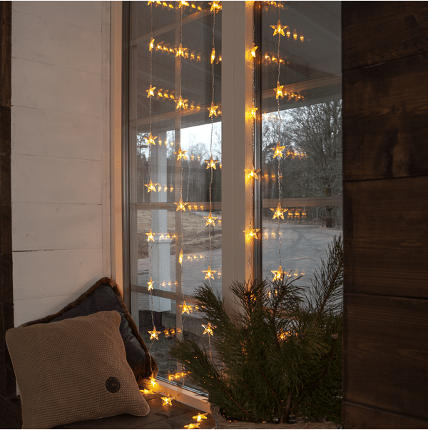 Lysgardin Star 2m Gennemsigtig Fra Star Trading - Smukt lysgardin med en varm hvid gl&oslash;d til indend&oslash;rs brug.