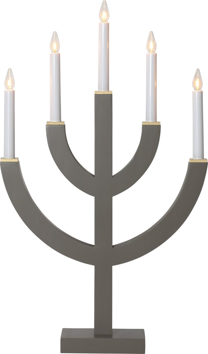 Anno Muldvarp Fra Star Trading - med malede tr&aelig;bakker i guld som dekoration.