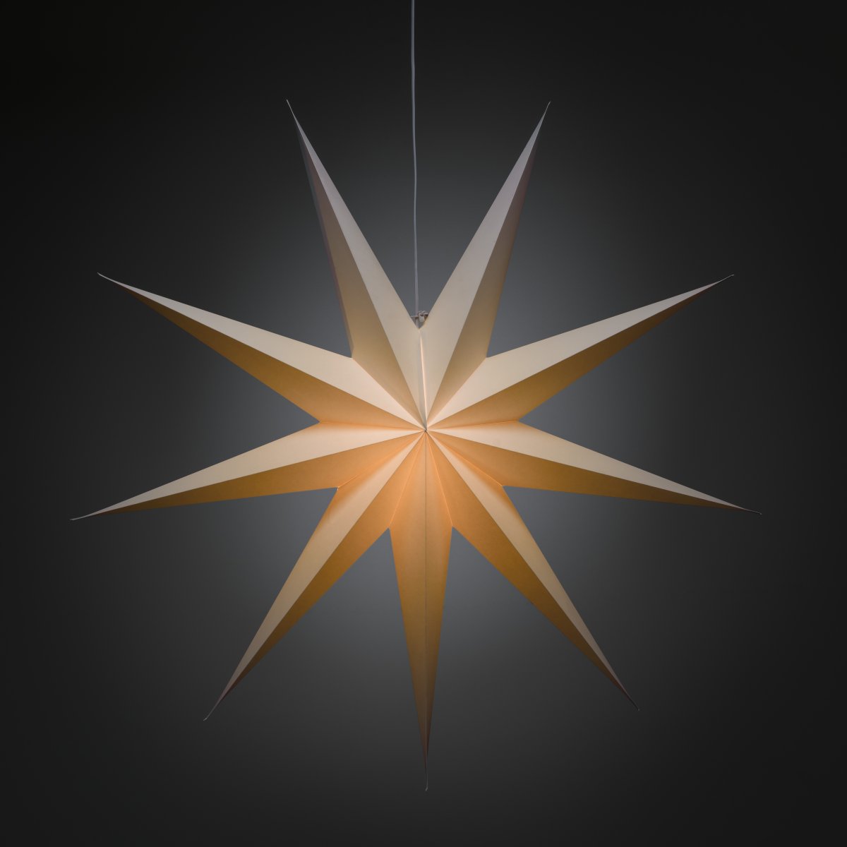Papirstjerne Ø115 Hvid Fra Konstsmide - Perfekt til at h&aelig;nge i vinduet eller op ad en smuk v&aelig;g &ndash; en tidl&oslash;s dekoration, der forgylder ethvert rum med enkel elegance.