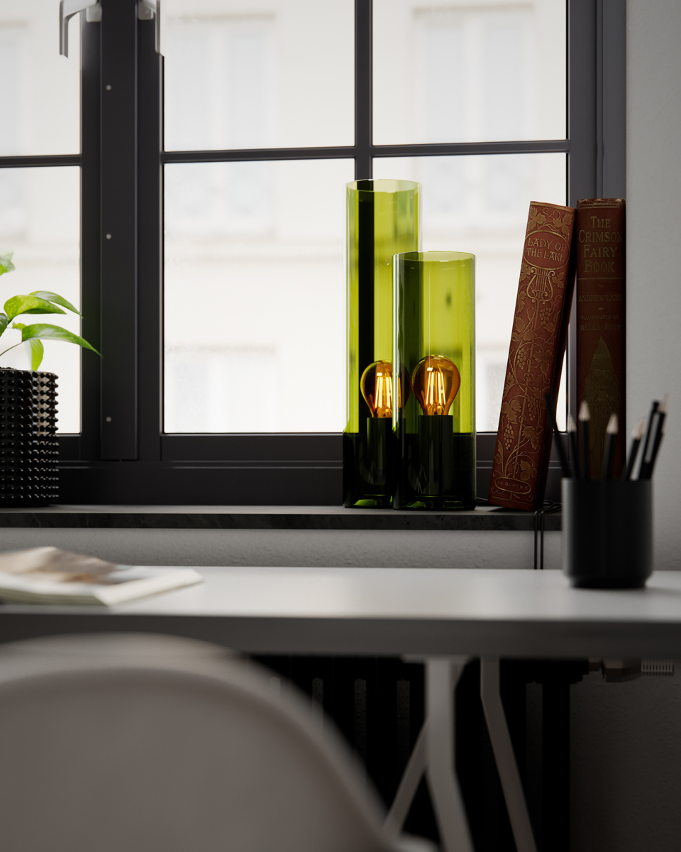 Flake 30cm Grøn bordlampe Fra By Rydéns - Med sit elegante cylinderformede glas og tilg&aelig;ngelighed i trendy farver som m&oslash;rk rav og gr&oslash;n samt hvid, er Flake den perfekte lampe til at skabe stil og atmosf&aelig;re i dit hjem.