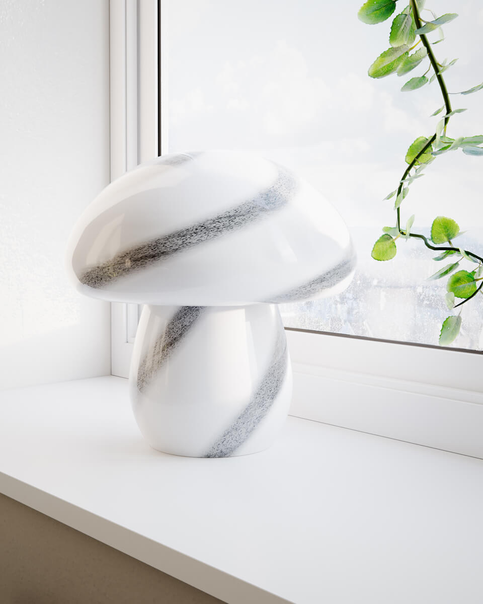 Mira Mushroom 30cm Hvid/sort bordlampe Fra By Rydéns - Lampen er ikke kun en funktionel lyskilde, men ogs&aring; en kunstnerisk detalje, der fremh&aelig;ver dit interi&oslash;r med sit naturinspirerede design og h&aring;ndlavede kvalitet.