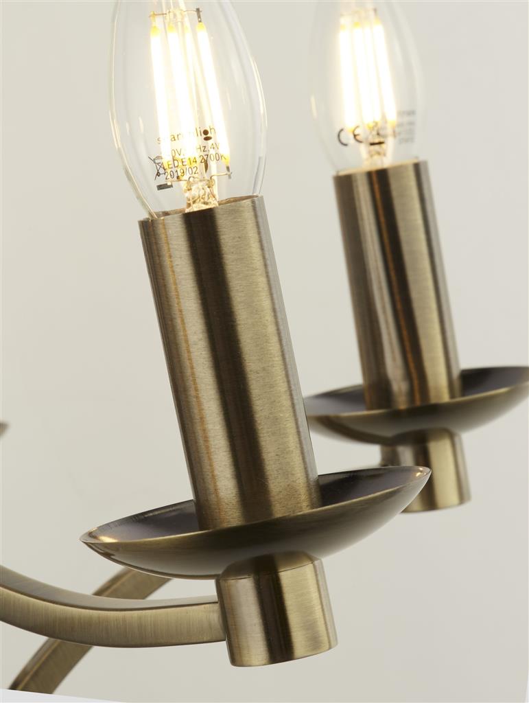 Ascot Ø88 Antik messing loftslampe Fra Searchlight - Med en generøs diameter på 88 cm og i alt 12 lampeholdere giver den en kraftfuld og jævn belysning.