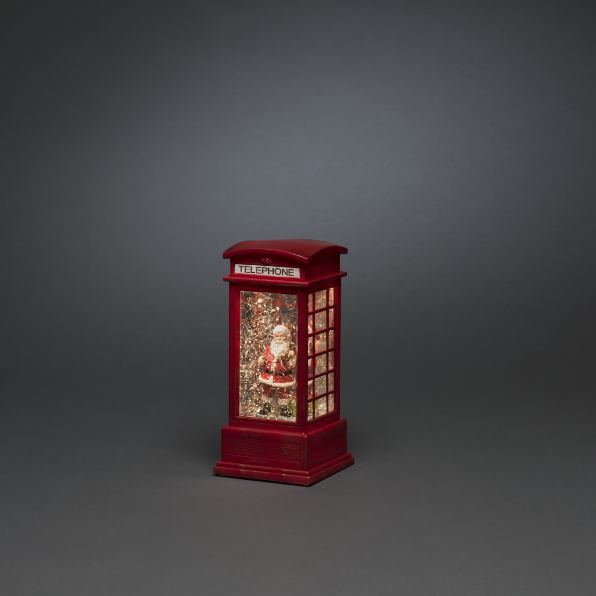 Vandfyldt lanterne Telefonboks RØD Fra Konstsmide - Vandfyldt lanterne Telefonkiosk er en stemningsfuld juledekoration med en charmerende julemand inde i en klassisk r&oslash;d telefonkiosk.