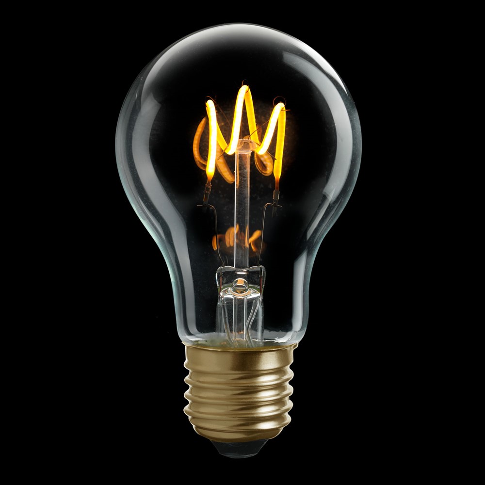 E27 normal 3W 2200K Dæmpbar Gennemsigtig Fra Unison - UNI-FLEX normal klar E27 d&aelig;mpbar lyskilde med en effekt p&aring;; 3W og et varmt lys p&aring; 2200K giver elegant og behagelig belysning.