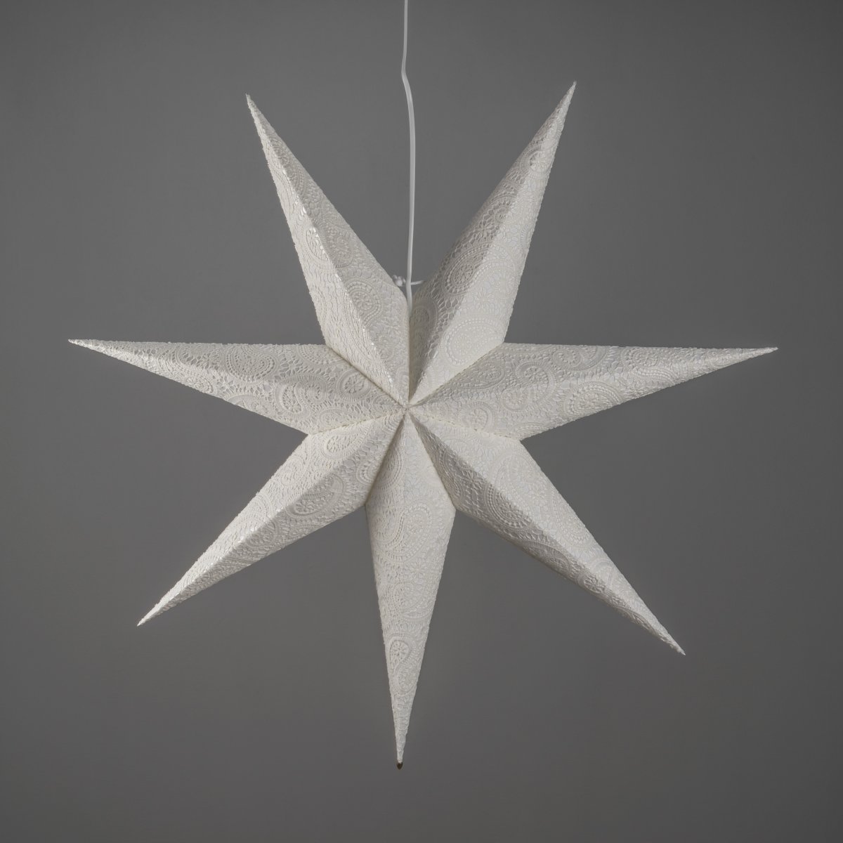Papirstjerne m. broderi Ø80 Hvid Fra Konstsmide - Med sin diameter p&aring; 80 cm er den perfekt til at h&aelig;nge i et vindue, hvor den vil v&aelig;re et smukt blikfang i advent og jul.