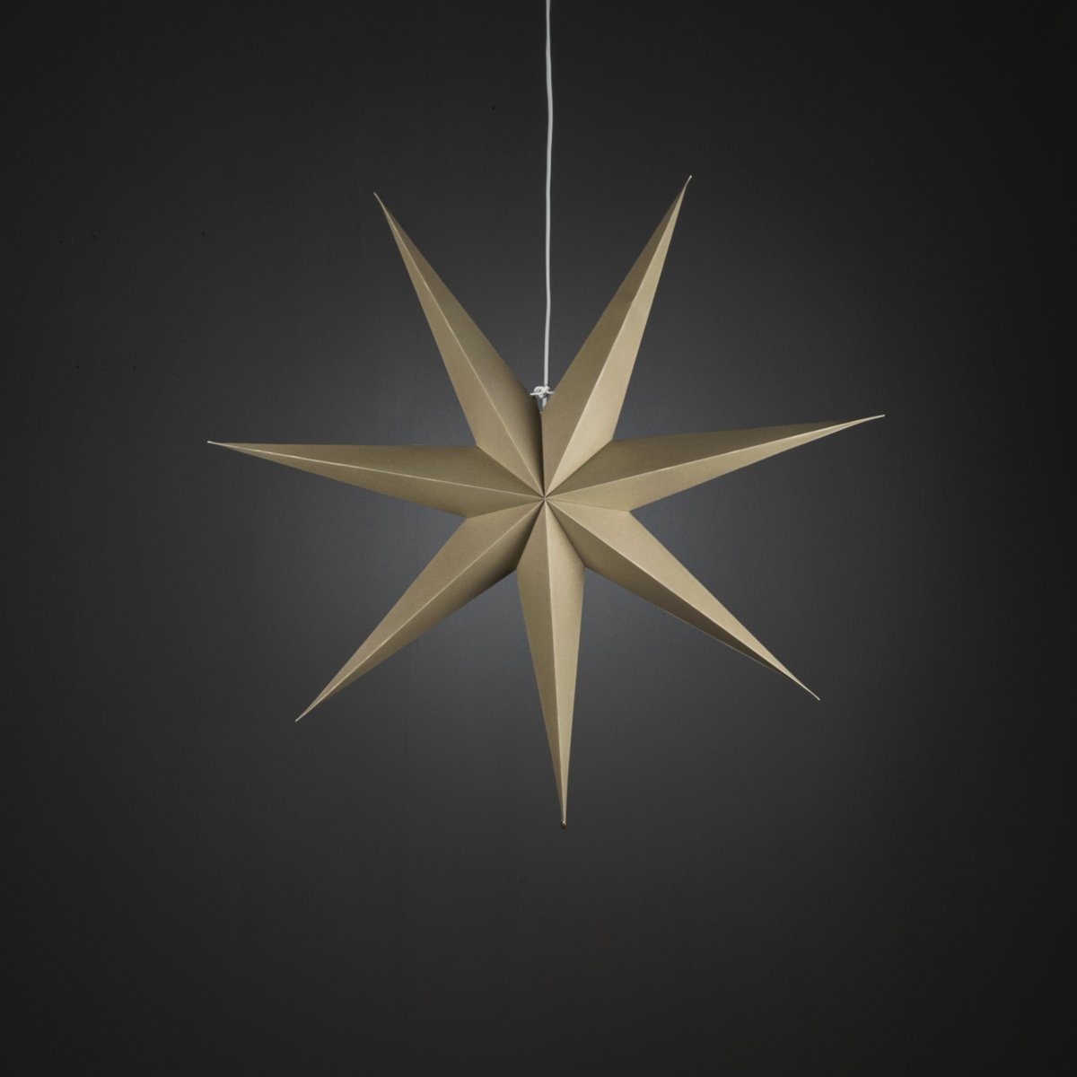 Papirstjerne Ø78 Beige Fra Konstsmide - Det enkle, elegante design spreder et blødt og behageligt lys, der giver en harmonisk følelse i advent og jul.