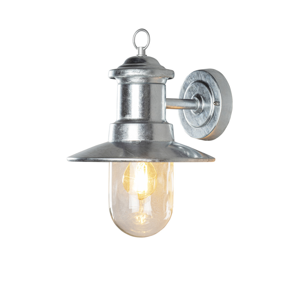 Napoli Varmgalvaniseret udendørslampe Fra Konstsmide - Lampens klassiske design med en rund glaskuppel og en bred skærm spreder et varmt og behageligt lys, perfekt til at oplyse indgange og terrasser.