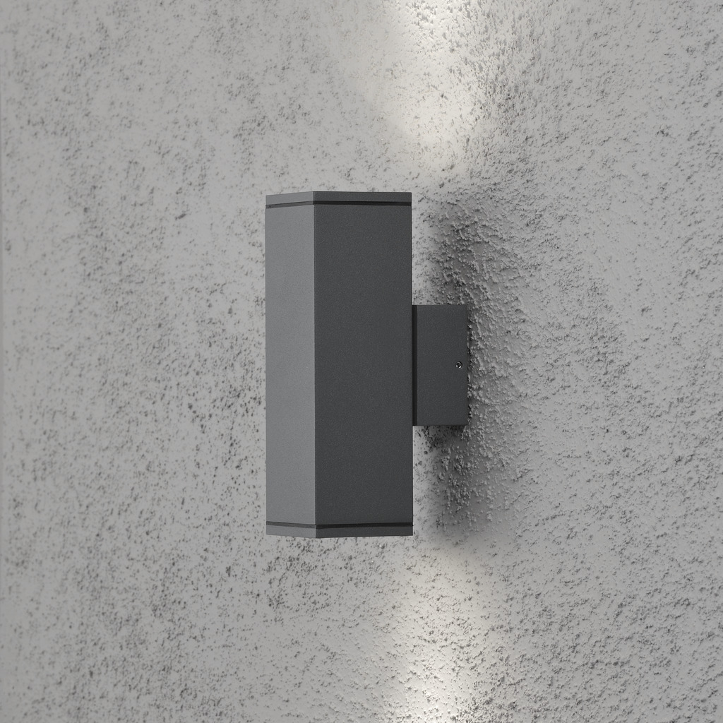 Monza Mørkegrå udendørslampe Fra Konstsmide - Skab en elegant og moderne belysningsløsning til din facade med denne mørkegrå væglampe, der lyser både op og ned.