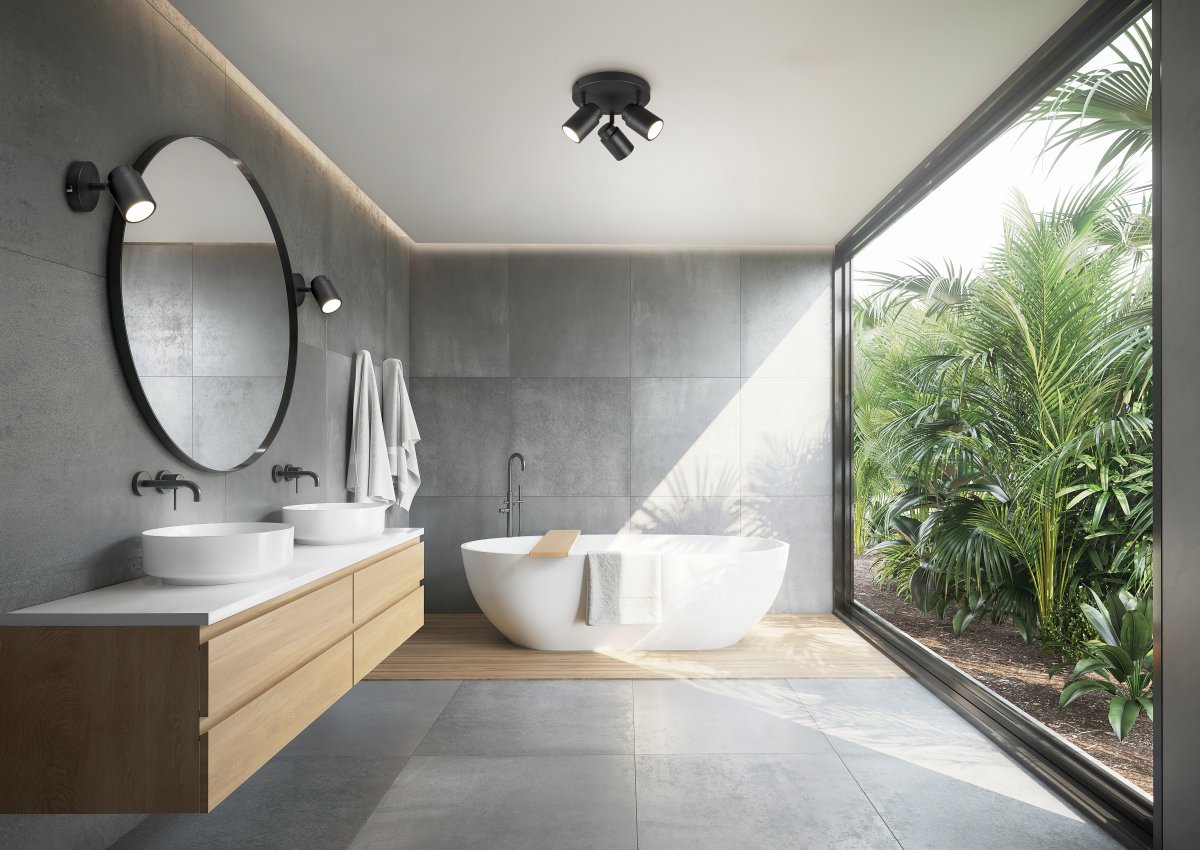 Angelo Ø20 Sort badeværelseslampe Fra Trio Lighting - Denne klassiske spotlight med trinløst justerbare skærme og IP44-beskyttelse er alsidig og passer både i vaskerummet og badeværelset.