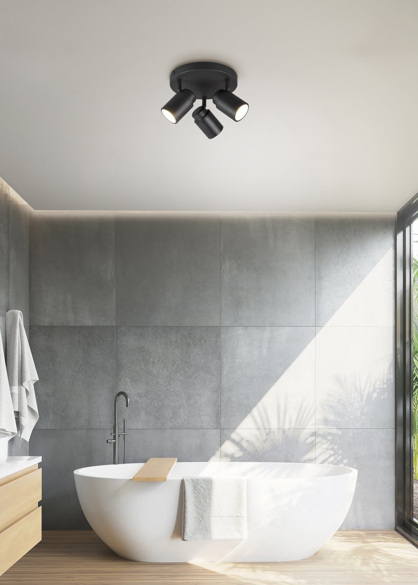 Angelo Ø20 Sort badeværelseslampe Fra Trio Lighting - Denne klassiske spotlight med trinløst justerbare skærme og IP44-beskyttelse er alsidig og passer både i vaskerummet og badeværelset.