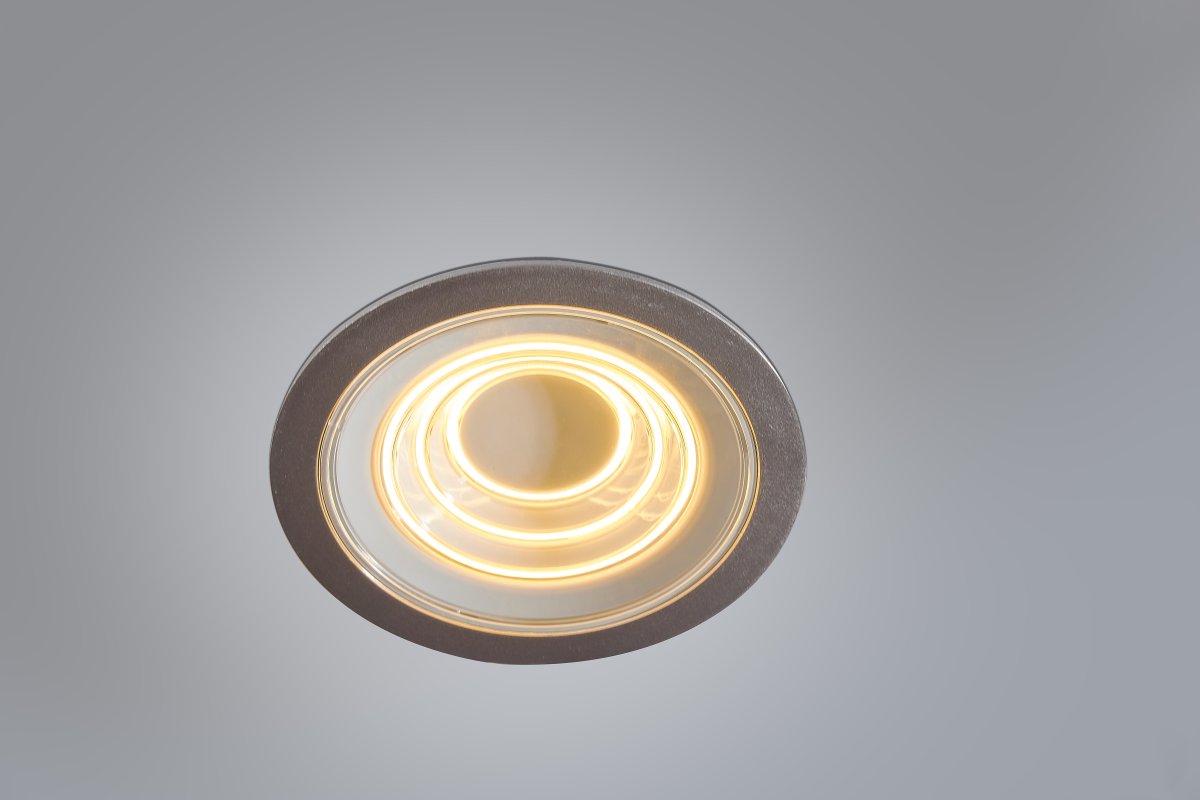 Decor Filament Ripple 9W Aluminium Fra Ledvance - Spotlyset har tre forskellige lyspunkter, en lille centreret cirkel, en st&oslash;rre midtercirkel og en st&oslash;rre ydre cirkel.