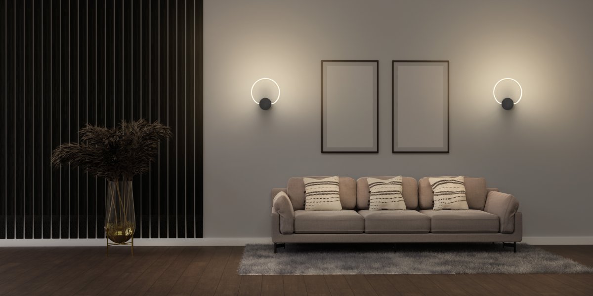 Aura Ø37 Sort væglampe Fra Ledvance - Lampan har tv&aring; olika belysningspunkter med integrerad LED, en bakom v&auml;ggplattan och cirkeln.