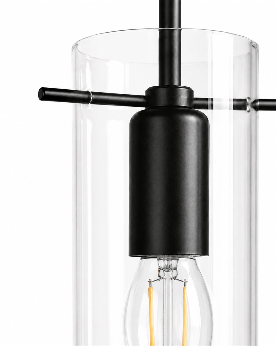 Cilinda Ø7 Sort/gennemsigtig vindueslampe Fra Nordic Lighting - Det klare glas skaber en flot spredning af lys og i kombination med det sorte metal bliver det en stilfuld indretningsdetalje.