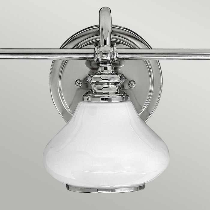 Ainsley 60cm Poleret krom badeværelseslampe Fra Elstead Lighting - De kuppelformede opalglassk&aelig;rme giver et bl&oslash;dt og behageligt lys og er kombineret med elegant poleret krom, der s&aelig;tter prikken over i'et.