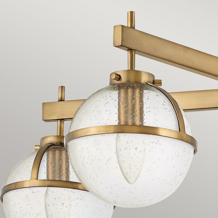 Hollis Ø80 Antik messing/transparent badeværelseslampe Fra Elstead Lighting - Hollis er en dekorativ loftlampe til badeværelset med et distinkt vintage-look og inspiration fra midten af det 20.