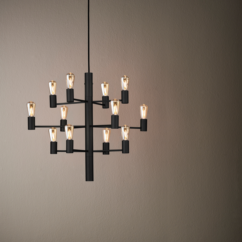 Manola 12 Ø60 Sort loftslampe Fra Herstal - Perfekt til placering i en rummelig entr&eacute; eller over spisebordet, hvor den kan tage sin plads og sprede et smukt lys.