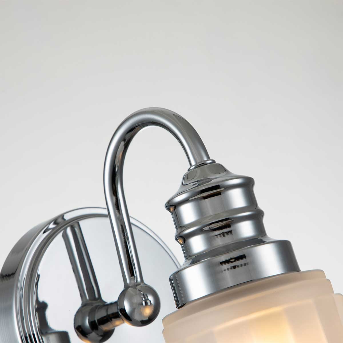 Swell Ø11 Poleret krom badeværelseslampe Fra Elstead Lighting - Den kombinerer elegance og funktionalitet med sin holdbare konstruktion og sofistikerede finish.