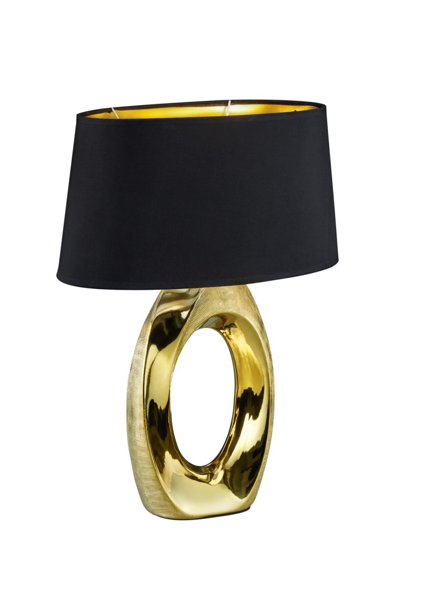 Taba 52cm Guld bordlampe Fra Trio Lighting - Med sine mål på 38x52 cm giver den den rette lysstemning og er dekorativ som sengelampe, på en byr&aring; eller et sidebord.