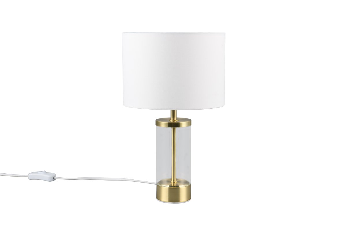 Grazia 34cm Mat messing bordlampe Fra Trio Lighting - Bordlampen Grazia kombinerer en elegant stofsk&aelig;rm med en stilren cylindrisk fod i glas og metal, som giver et harmonisk og sofistikeret indtryk.