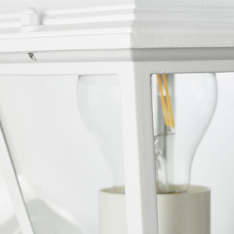 Nissie Hvid udendørslampe Fra Brilliant - Nissie væglampen er perfekt til at oplyse indgange eller terrassedøre og skaber tryghed på mørke aftener.