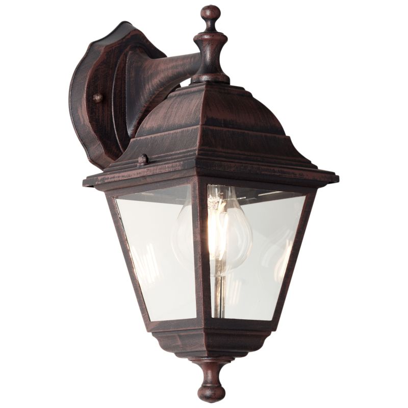 Nissie Rust udendørslampe Fra Brilliant - Det dekorative design får lampen til at falde naturligt i ét med husets facade.